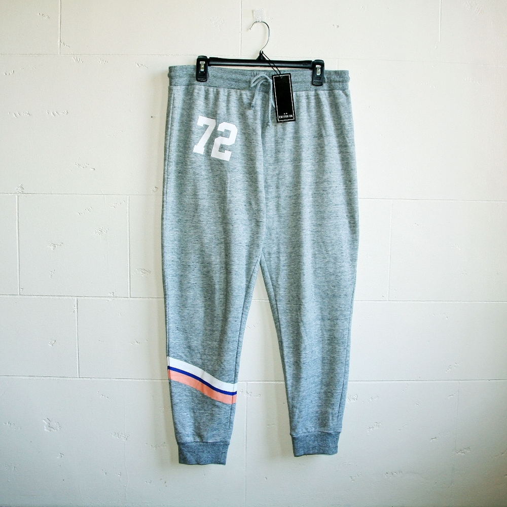 Cotton On joggers. Size XL. Heather color, with white, blue and pink stripes.